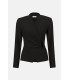 Top Brillo Negro Joseph Ribkoff Mujer